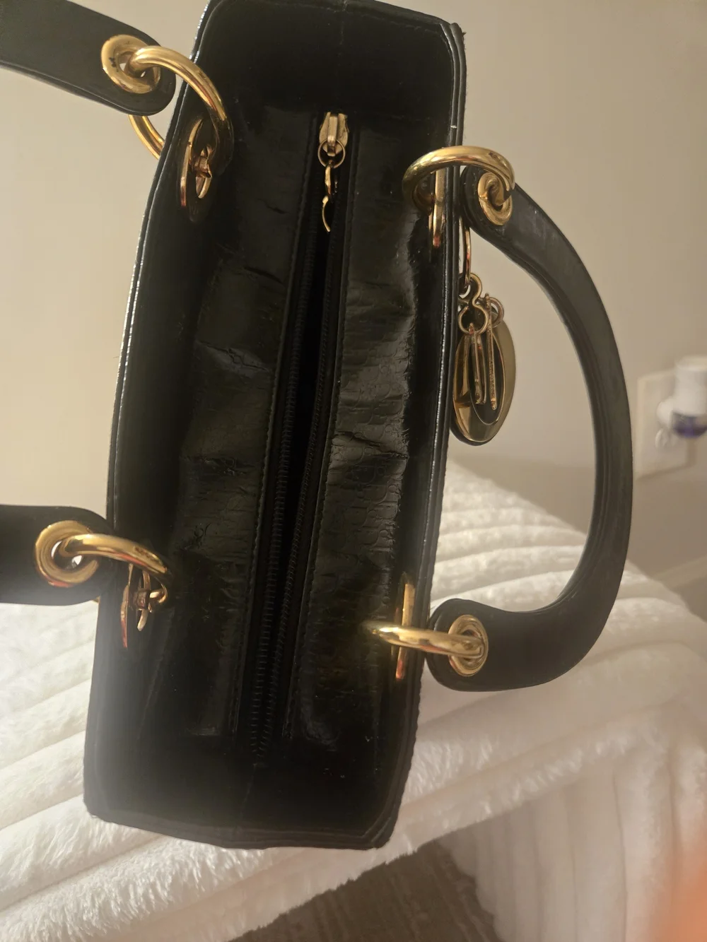 Black Structured Patent Leather Top-Handle Bag with Gold Hardware